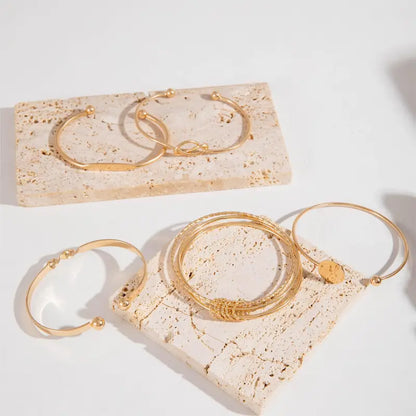 Set de Pulseras Nudo Elegante | Oro
