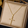 Collar Cruz con Cristal | Oro