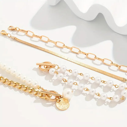 Set 4 Pulseras Chic - Serpiente, Perlas y Eslabones | Oro