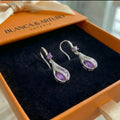 Calithra Lumen Twist Earrings | White Gold