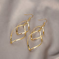 Pendientes Colgantes Minimalistas | Oro
