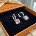 Pendientes Huggie Radiante Rosa | Oro Blanco