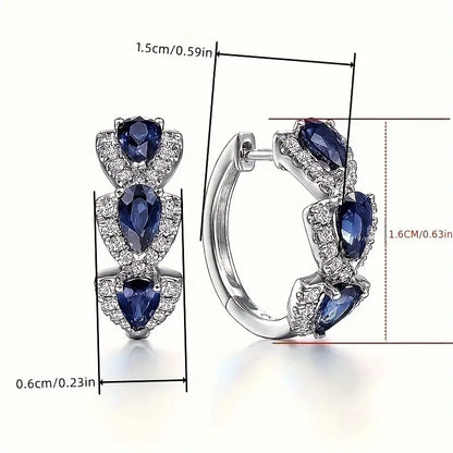 Pendientes Crest Zafiro Real | Oro Blanco